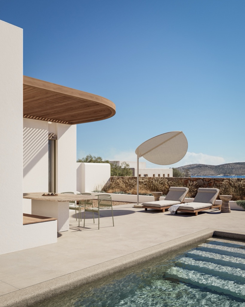 Curved pergola over an outdoor lounge by a pool with distant sea.