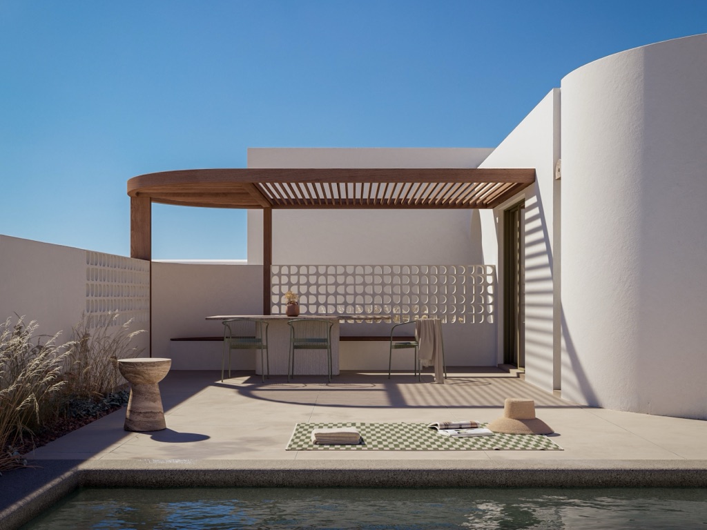 Poolside dining under a wooden pergola with breeze-block screen.